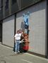 Standing next to the Once in a Blue Moose shop in Anchorage